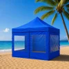 Gazebo plegable de aluminio color azul de 3×3 m armado en un jardín